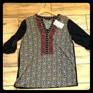 Black 3/4 length long sleeve top, with detail.